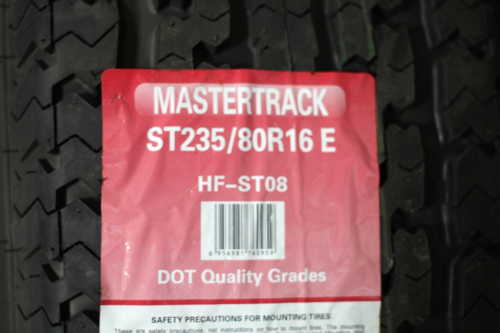 NEW/OLD STOCK MASTERTRACK TIRES & RIMS TIRES SIZE: 235/80R16 E Towing Products 